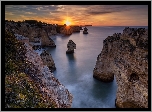 Wybrzeże, Skały, Chmury, Wschód słońca, Morze, Ocean Atlantycki, Region Algarve, Portugalia