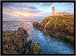 Morze, Latarnia morska Fanad Head Lighthouse, Skały, Wschód słońca, Chmury, Portsalon, Irlandia Północna
