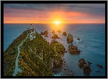 Nowa Zelandia, Region Otago, Latarnia morska, Nugget Point Fighthouse, Morze, Wschód słońca, Skały