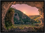 Portugalia, Buracas do Casmilo, Skały, Jaskinia, Zachód słońca