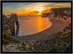 Anglia, Hrabstwo Dorset, Wybrzeże Jurajskie, Morze, Plaża, Skały, Łuk, Durdle Door, Zachód słońca