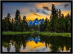 Drzewa, Góry, Teton Range, Rzeka, Snake River, Odbicie, Zachód słońca, Park Narodowy Grand Teton, Wyoming, Stany Zjednoczone