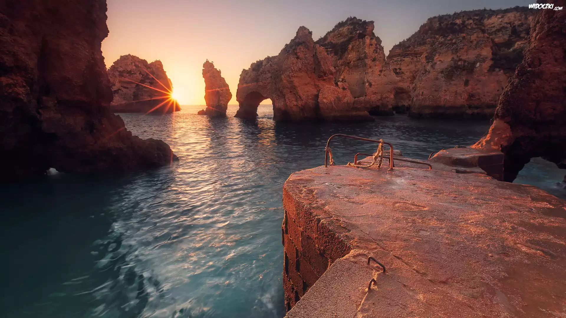 Morze, Skały, Promienie słońca, Cypel Ponta da Piedade, Portugalia