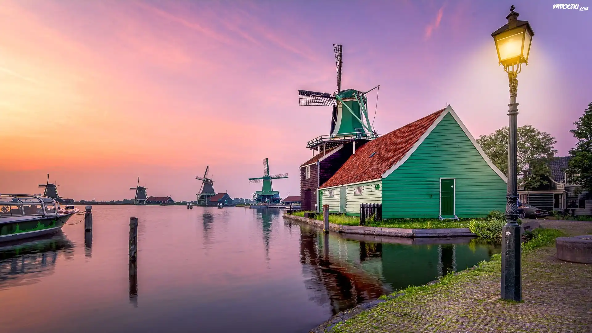 Rzeka, Wiatraki, Zachód słońca, Domy, Latarnia, Łódź, Skansen Zaanse Schans, Zaandam, Holandia